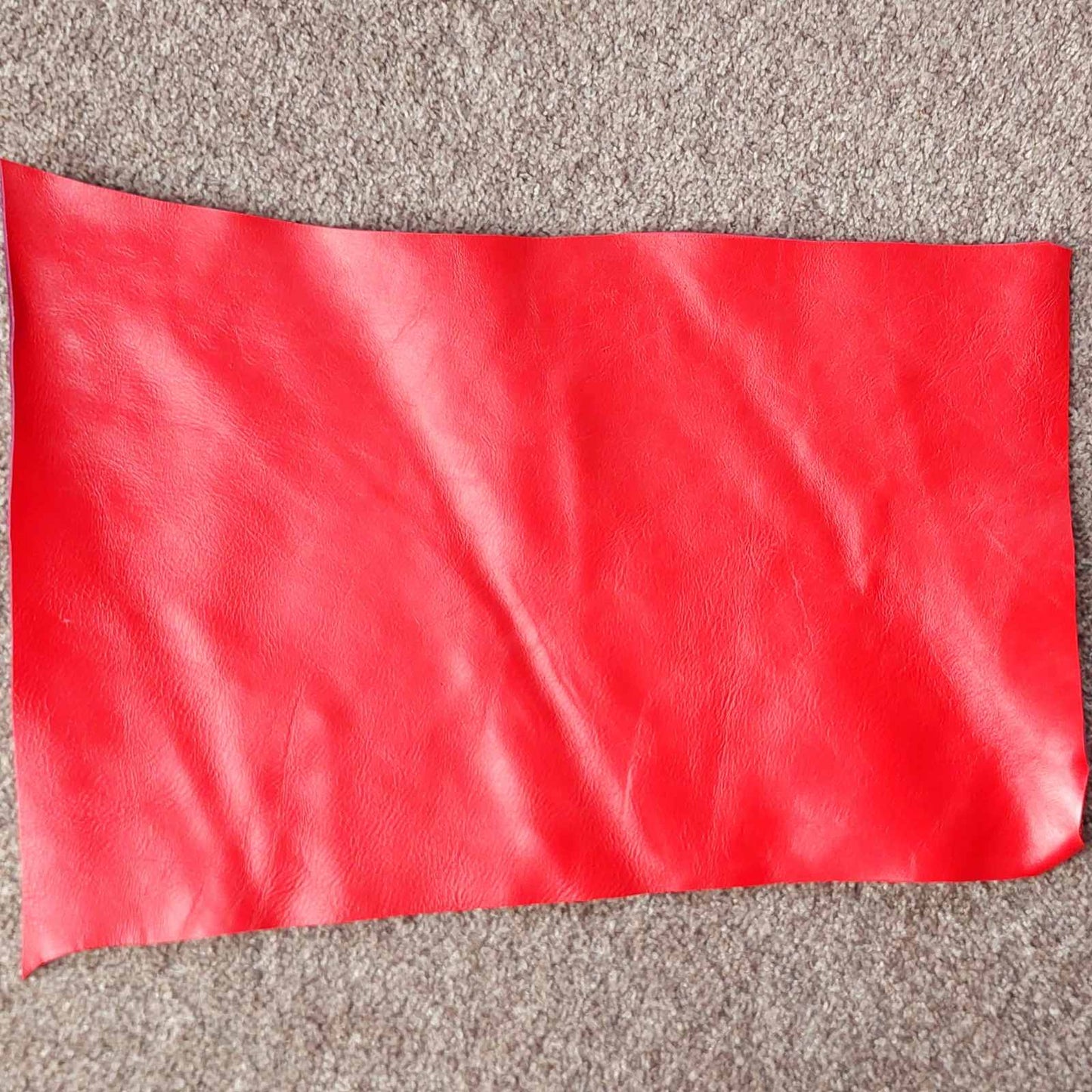 Red Scrap Leather Piece